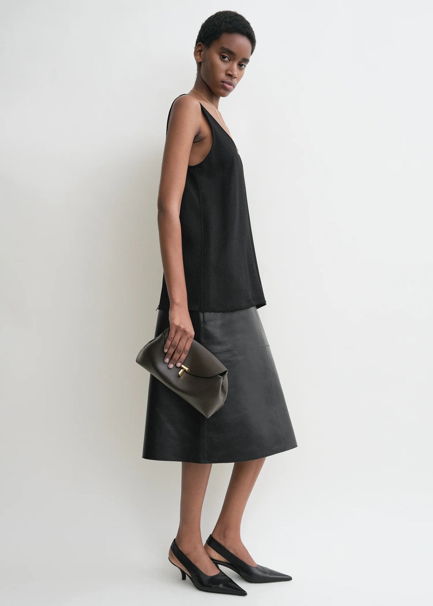 Toteme T-Lock leather clutch bark