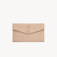 YSL Pochette UPTOWN in pelle goffrata grain de poudre Dark Beige