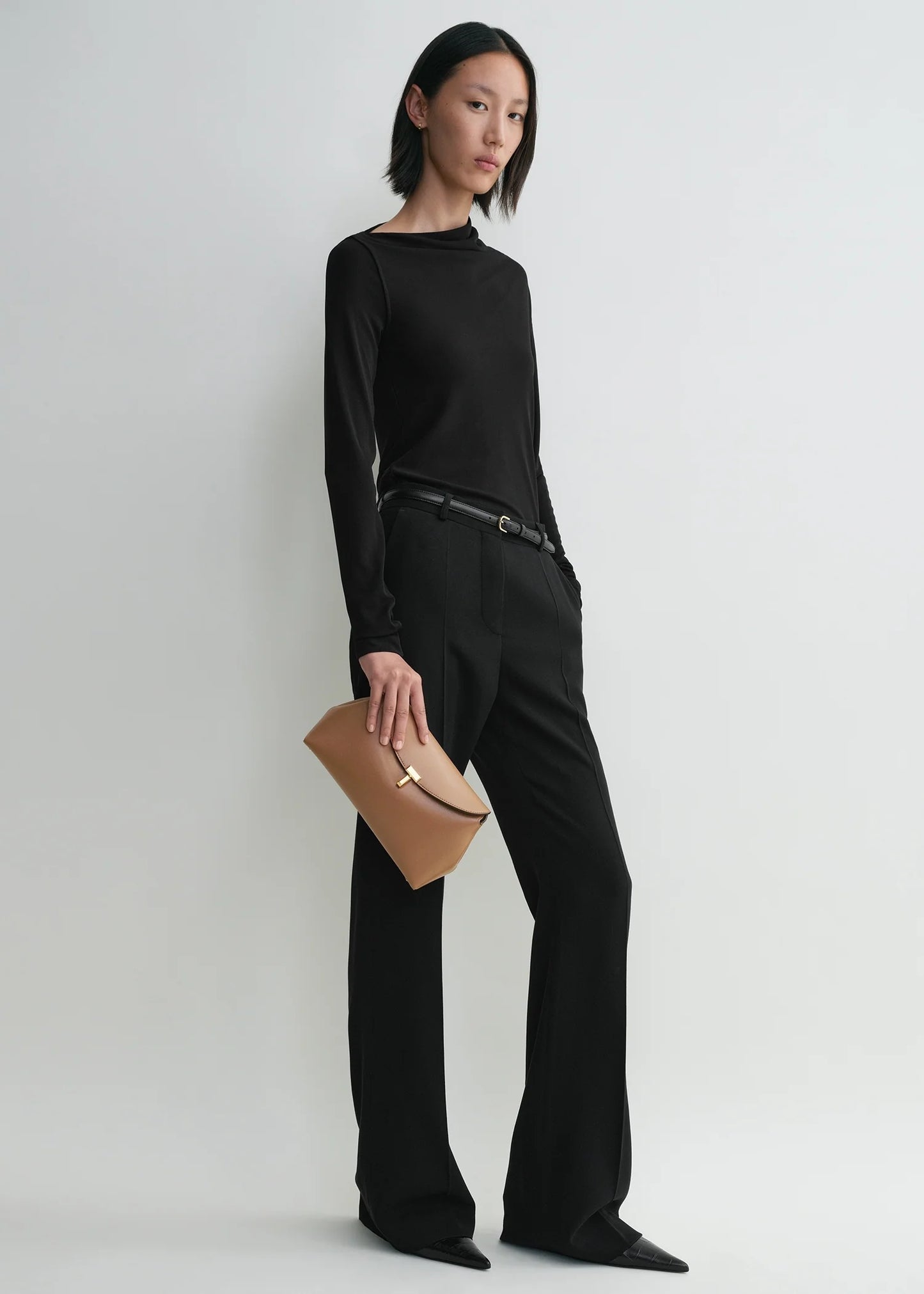 Toteme T-Lock leather clutch camel