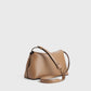 Toteme T-Lock leather clutch camel