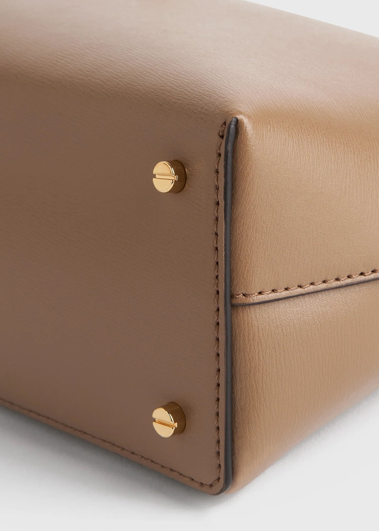 Toteme T-Lock leather clutch camel