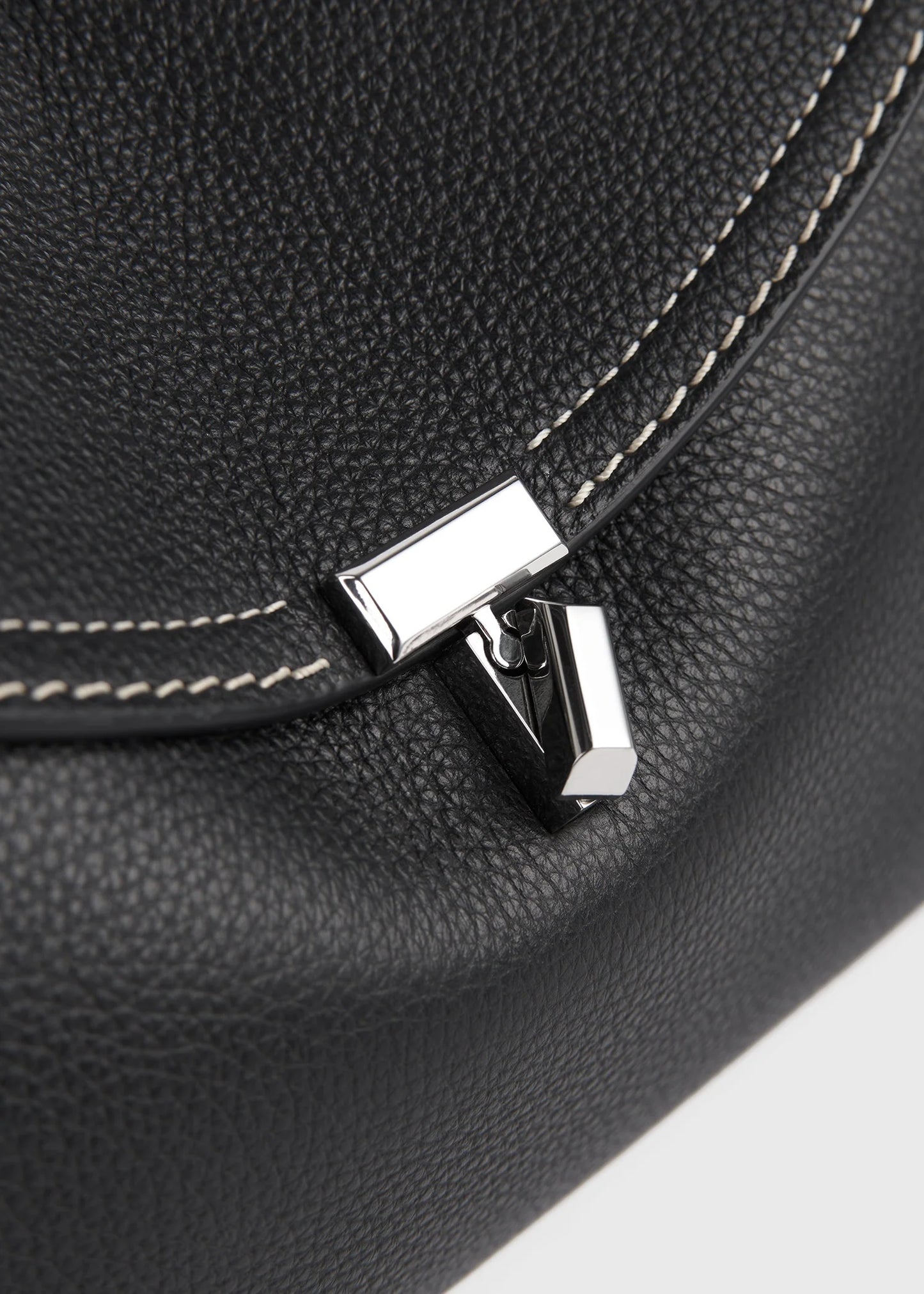 Toteme T-Lock grained-leather clutch black