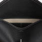Toteme T-Lock grained-leather clutch black