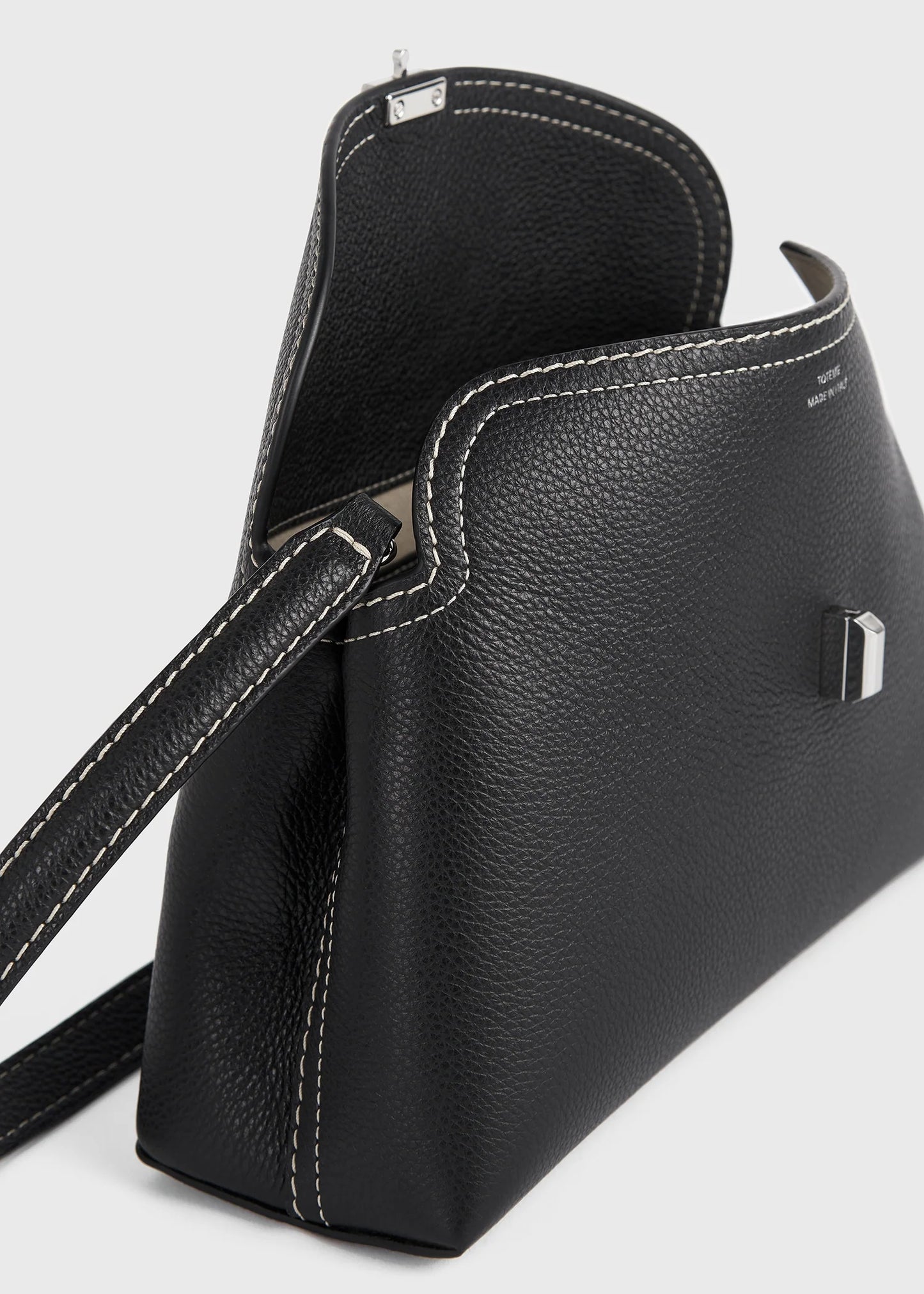 Toteme T-Lock grained-leather clutch black