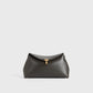 Toteme T-Lock leather clutch bark