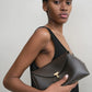 Toteme T-Lock leather clutch bark