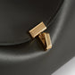 Toteme T-Lock leather clutch bark