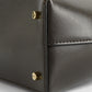 Toteme T-Lock leather clutch bark