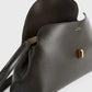 Toteme T-Lock leather clutch bark