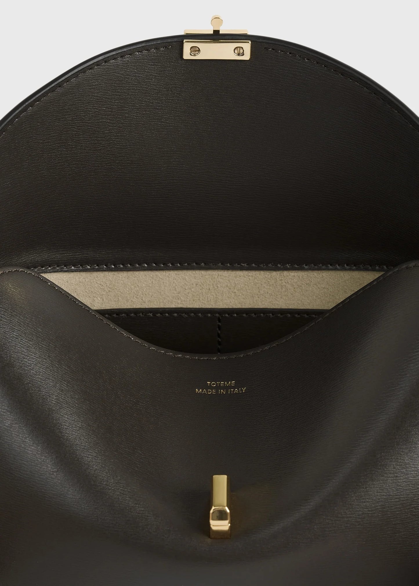 Toteme T-Lock leather clutch bark