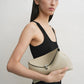 Toteme T-Lock leather clutch fawn